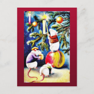 Three mice playing with gifts in the christmas tre holiday postcard