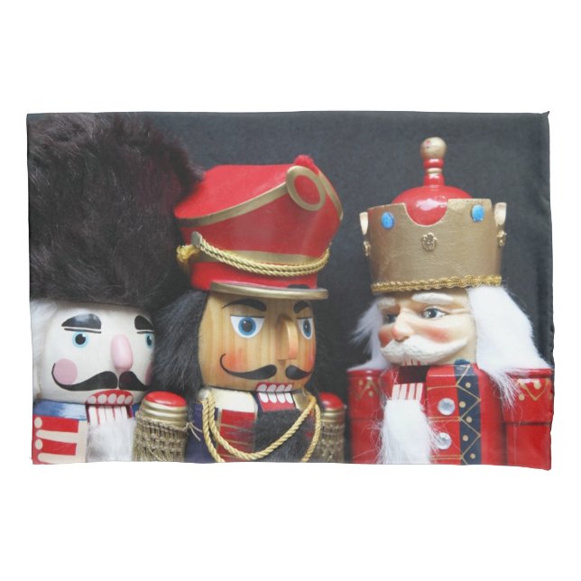 Three nutcrackers on dark background pillowcase (Front)