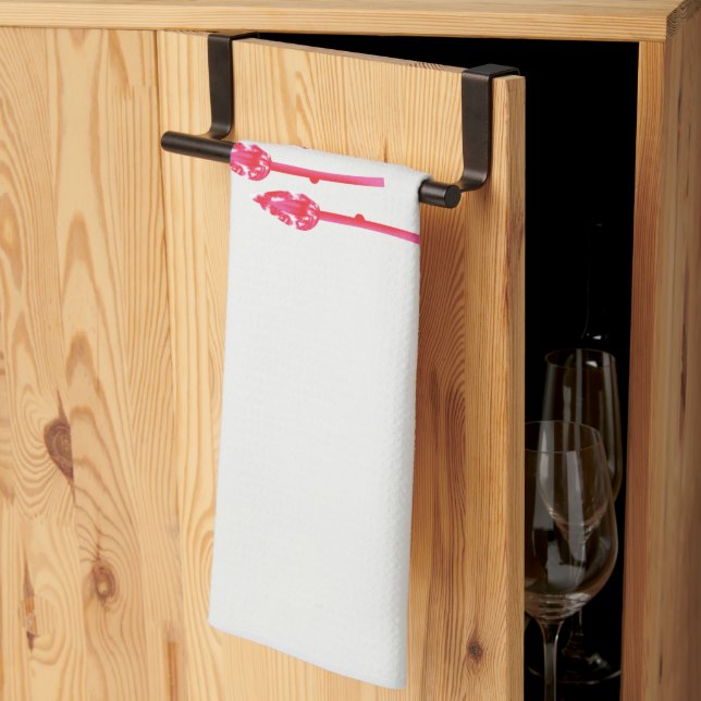 Three pink flowers with a black background tea towel (Thirds Fold)