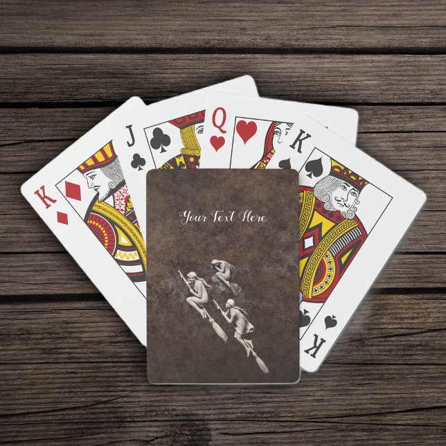 Three Pretty White Light Witches Flying on Brooms  Playing Cards (Three pretty white witches flying on brooms on mottled brown deck of playing cards.)