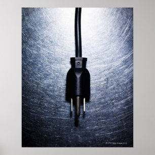 Three-pronged electrical plug on stainless poster