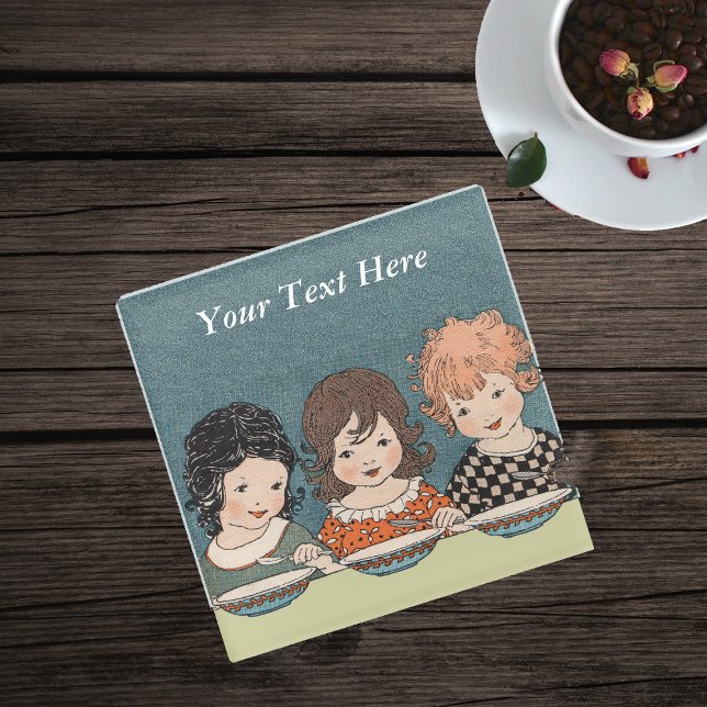 Three Sisters Together Eating Soup Glass Coaster (Three little girls blond, redhead and dark hair sitting together eating soup on blue drink coaster.)