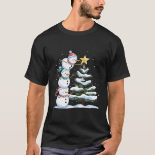 Three Snowmen Are Arranging A Christmas Tree Cute  T-Shirt