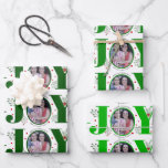 Three tone green Joy Christmas holiday photo Wrapping Paper Sheet<br><div class="desc">Three tone green Joy Christmas holiday photo Wrapping Paper Sheets. Each sheet showcases a pattern of the word "JOY" in different green shades with red berries and greenery while instead of the letter "O" there is your photo.</div>