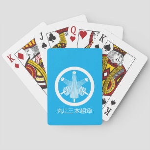 Three umbrellas, staggered in circle playing cards