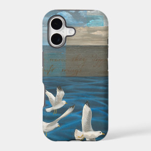 Three White Seagulls Flying Over the Water