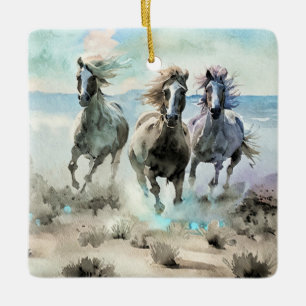 Three Wild Horses Race Across a Dusty Prairie Ceramic Ornament