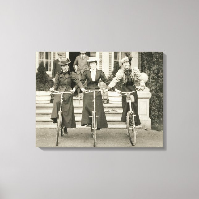 Three women on bicycles, early 1900s (b/w photo) canvas print (Front)