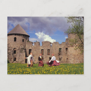 Three young women in traditional clothes postcard