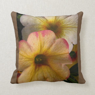 Throw pillow adorned with beautiful floral photo.