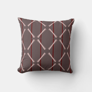 Throw pillow in shades of wine.
