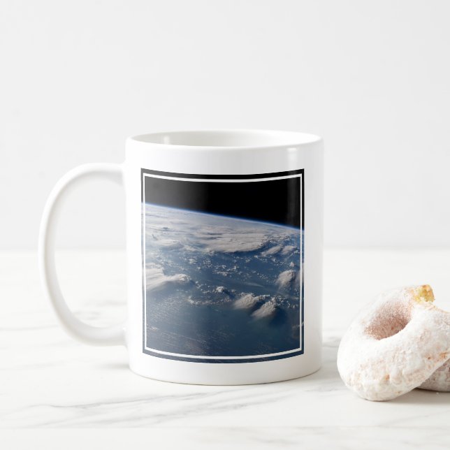 Thunderhead Anvils Of Earth Onto Southern Borneo. Coffee Mug (With Donut)