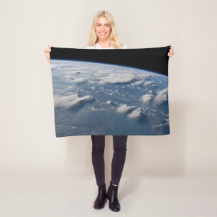 Thunderhead Anvils Of Earth Onto Southern Borneo. Fleece Blanket