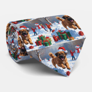 Tibetan Mastiff Running in Snow with Christmas Hat Tie
