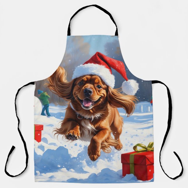 Tibetan Spaniel Running in Snow with Christmas Hat Apron (Front)