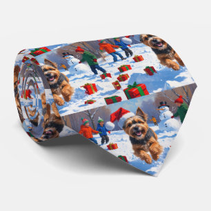 Tibetan Terrier Running in Snow with Christmas Hat Tie