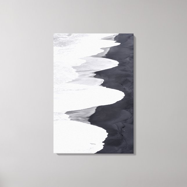 Tide Washes Over Black Beach Canvas Print (Front)