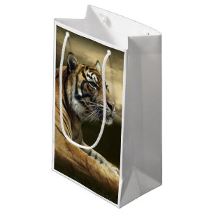 Tiger looking and sitting under dramatic sky small gift bag