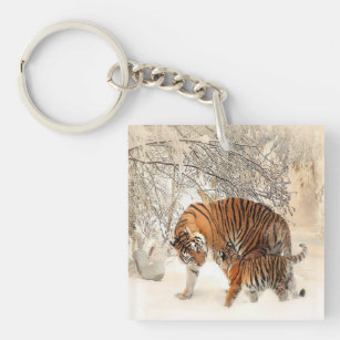 tigers on snow key ring