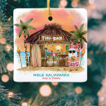 Tiki Beach Tropical Sunset Mele Kalikimaka Santa Ceramic Ornament<br><div class="desc">Tropical Christmas ornament features Santa enjoying a vacation at a Tiki bar on the beach at sunset with palm trees, string lights and Hawaiian "Aloha" and "Mele Kalikimaka" greetings. Tropical cocktails, a pineapple, hibiscus and palm leaves, a surfboard and a parrot in a pirate hat decorate the bar area. Personalise...</div>