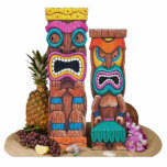 Tiki Totems Sculpture Standing Photo Sculpture<br><div class="desc">5” x 7” acrylic photo sculpture of two colourful wooden tiki totems,  an orchid lei,  a pineapple,  a bunch of grapes,  a lemon slice and assorted seashells. See the entire Shipwreck Photo Sculpture collection in the DECOR | Props & Centerpieces section.</div>