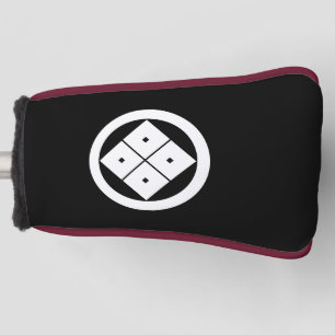 Tilted four-square-eyes in a circle golf head cover