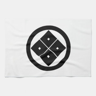 Tilted four-square-eyes in circle tea towel