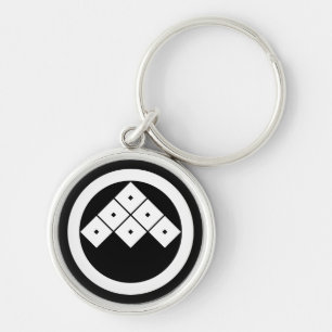 Tilted six-squrae-eyes in circle key ring