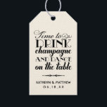 Time to Drink Champagne Quote Wedding Monogram Gift Tags<br><div class="desc">Fun vintage inspired wedding favour tag features black "Time to Drink Champagne and Dance on the Table" stylish mixed typography and a monogram of the bride and groom names and wedding date. A modern wide stripes pattern dresses up the back of the card. The soft white / light ivory background...</div>
