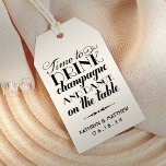Time to Drink Champagne Quote Wedding Monogram Gift Tags<br><div class="desc">Fun vintage inspired wedding favour tag features black "Time to Drink Champagne and Dance on the Table" stylish mixed typography and a monogram of the bride and groom names and wedding date. A modern wide stripes pattern dresses up the back of the card. The soft white / light ivory background...</div>