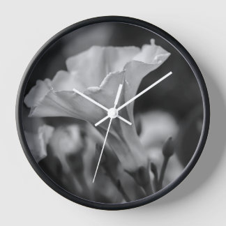 Timeless Elegance: Black and White Floral Clock
