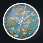 Timeless Elegance: Van Gogh's Almond Blossom  Clock<br><div class="desc">Elevate your space with our exclusive Van Gogh's Almond Blossom Wall Clock from the Brand New Retro Art collection on Zazzle. Immerse yourself in the timeless beauty of Vincent van Gogh's masterpiece, digitally enhanced to captivate every intricate detail. This high-quality print boasts unparalleled resolution, bringing the delicate blossoms to life...</div>