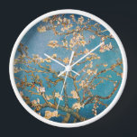 Timeless Elegance: Van Gogh's Almond Blossom  Clock<br><div class="desc">Elevate your space with our exclusive Van Gogh's Almond Blossom Wall Clock from the Brand New Retro Art collection on Zazzle. Immerse yourself in the timeless beauty of Vincent van Gogh's masterpiece, digitally enhanced to captivate every intricate detail. This high-quality print boasts unparalleled resolution, bringing the delicate blossoms to life...</div>
