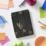 Timeless Luxury | Minimal Monogram  iPad Pro Cover<br><div class="desc">Upgrade your tech accessories with a touch of sophistication. The Timeless Luxury | Minimal Monogram iPad Pro Cover features a sleek black background adorned with elegant gold geometric accents, creating a modern yet classic look. Personalise it with your initials for a truly bespoke touch. Features: ✅ Premium Protection – Safeguard...</div>