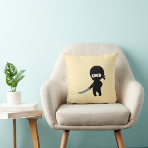Tiny Angry Ninja on Yellow Cushion
