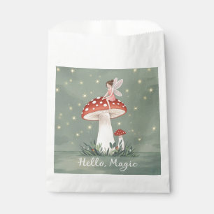 Tiny fairy perched on top of mushroom and glowing favour bags