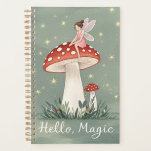 Tiny fairy perched on top of mushroom and glowing planner