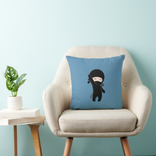 Tiny Happy Ninja on Blue Cushion