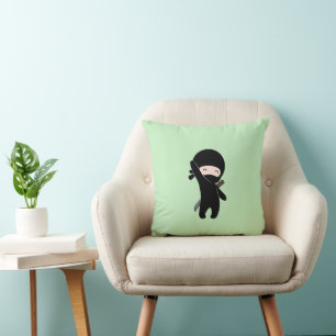Tiny Happy Ninja on Green Cushion