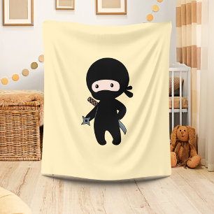 Tiny Ninja Holding Throwing Star On Yellow Fleece Blanket
