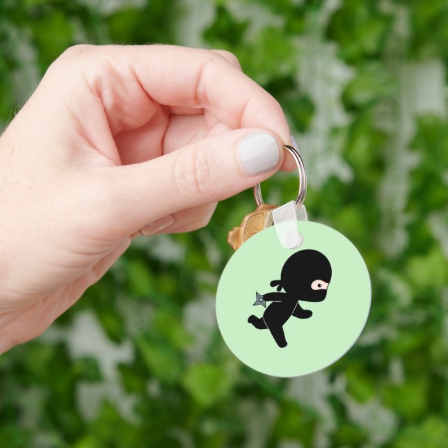 Tiny Ninja Running on Green Key Ring (Hand)