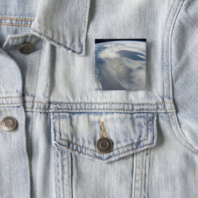 Tiny Satellites Orbit Above A Part Of Earth. 15 Cm Square Badge (In Situ)