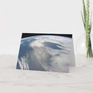 Tiny Satellites Orbit Above A Part Of Earth. Card