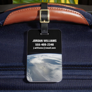 Tiny Satellites Orbit Above A Part Of Earth. Luggage Tag