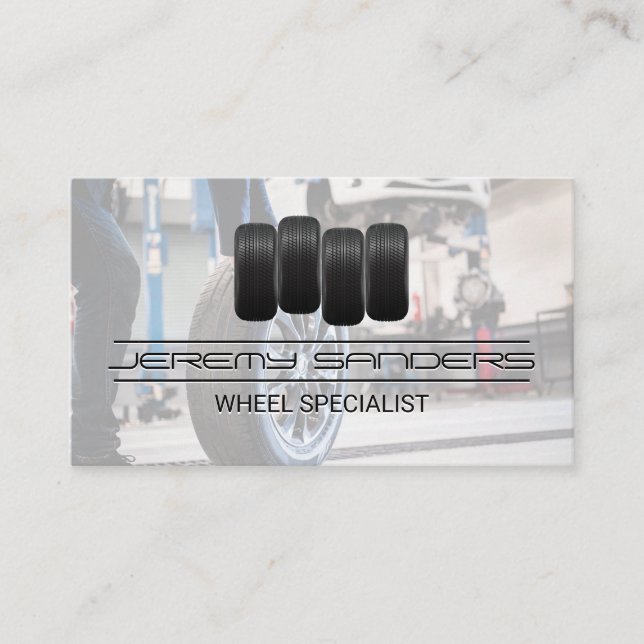 Tire and Wheel Service | Man working on Tires Business Card (Front)