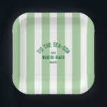Tis The SeaSon Custom Beach Christmas Green Stripe Paper Plate<br><div class="desc">The ’Tis The Sea-Son Custom Beach Christmas Green Stripe Paper Plates add festive flair and seaside charm to your holiday celebrations. Featuring a playful green cabana stripe design with customisable beach name and year, these durable paper plates are perfect for serving meals, appetizers, or desserts. Convenient and disposable yet stylish...</div>