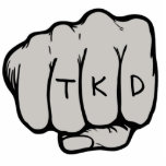 TKD Fist Ornament Photo Sculpture Decoration<br><div class="desc">The martial arts TKD Fist Ornament makes a unique taekwondo gift idea for a birthday,  Christmas,  holiday or belt rank promotion test or exam. This martial arts ornament features a fist design in a middle punch  (courtesy of designious.com) with the letters tkd on the knuckles.</div>