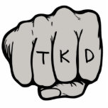 TKD Fist Ornament Photo Sculpture Decoration<br><div class="desc">The martial arts TKD Fist Ornament makes a unique taekwondo gift idea for a birthday,  Christmas,  holiday or belt rank promotion test or exam. This martial arts ornament features a fist design in a middle punch  (courtesy of designious.com) with the letters tkd on the knuckles.</div>