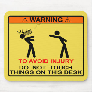 TO AVOID INJURY, DO NOT TOUCH THINGS ON THIS DESK MOUSE MAT