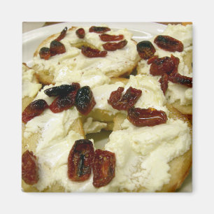 Toasted bagel with goat cheese magnet